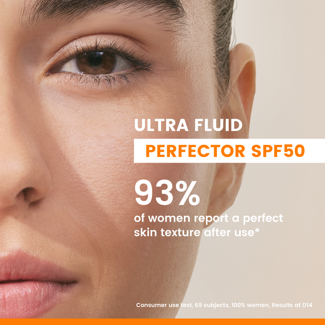 Advertisement for Ultra Fluid Perfector SPF50 with a close-up of a woman's face.