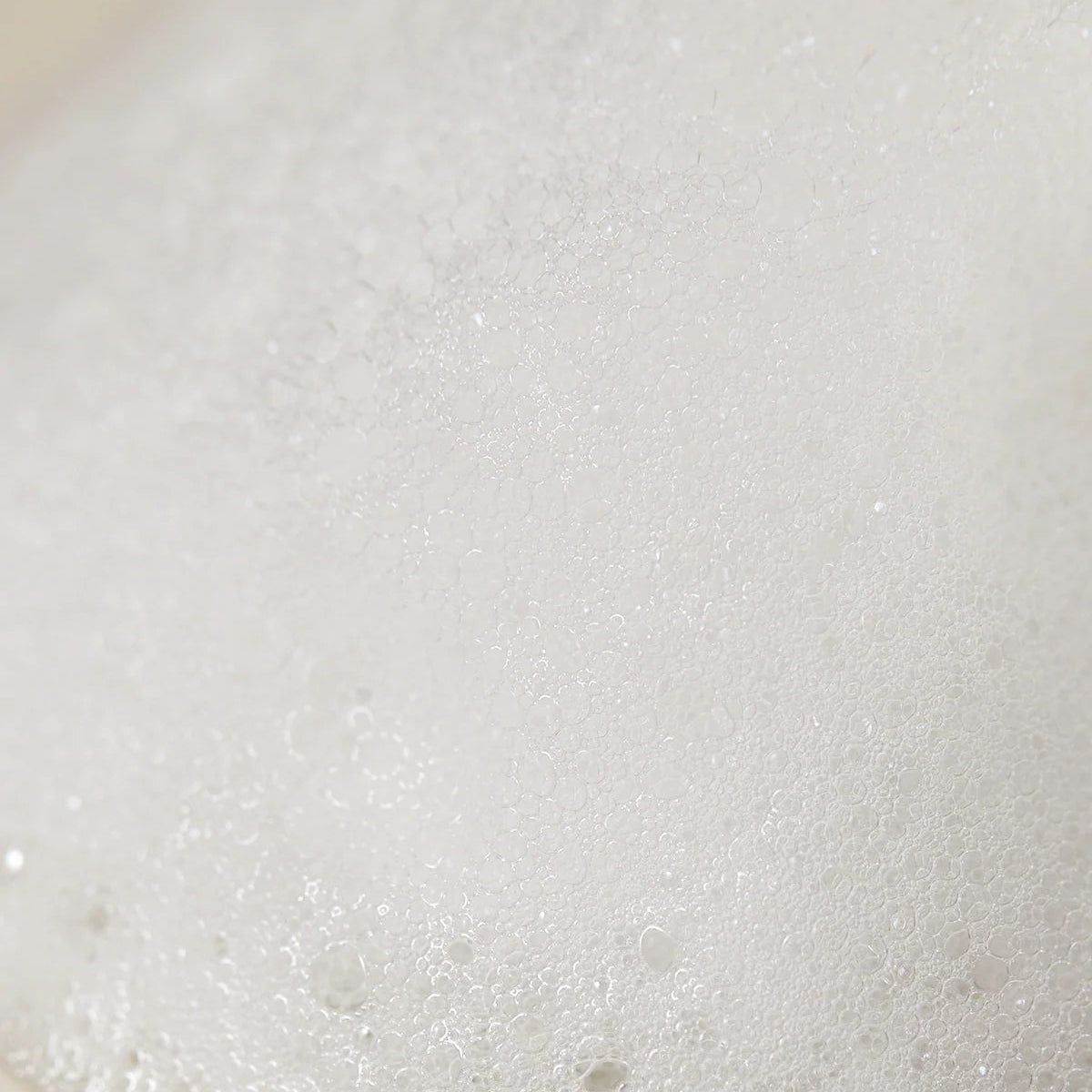 Close-up of a textured white surface with small bubbles