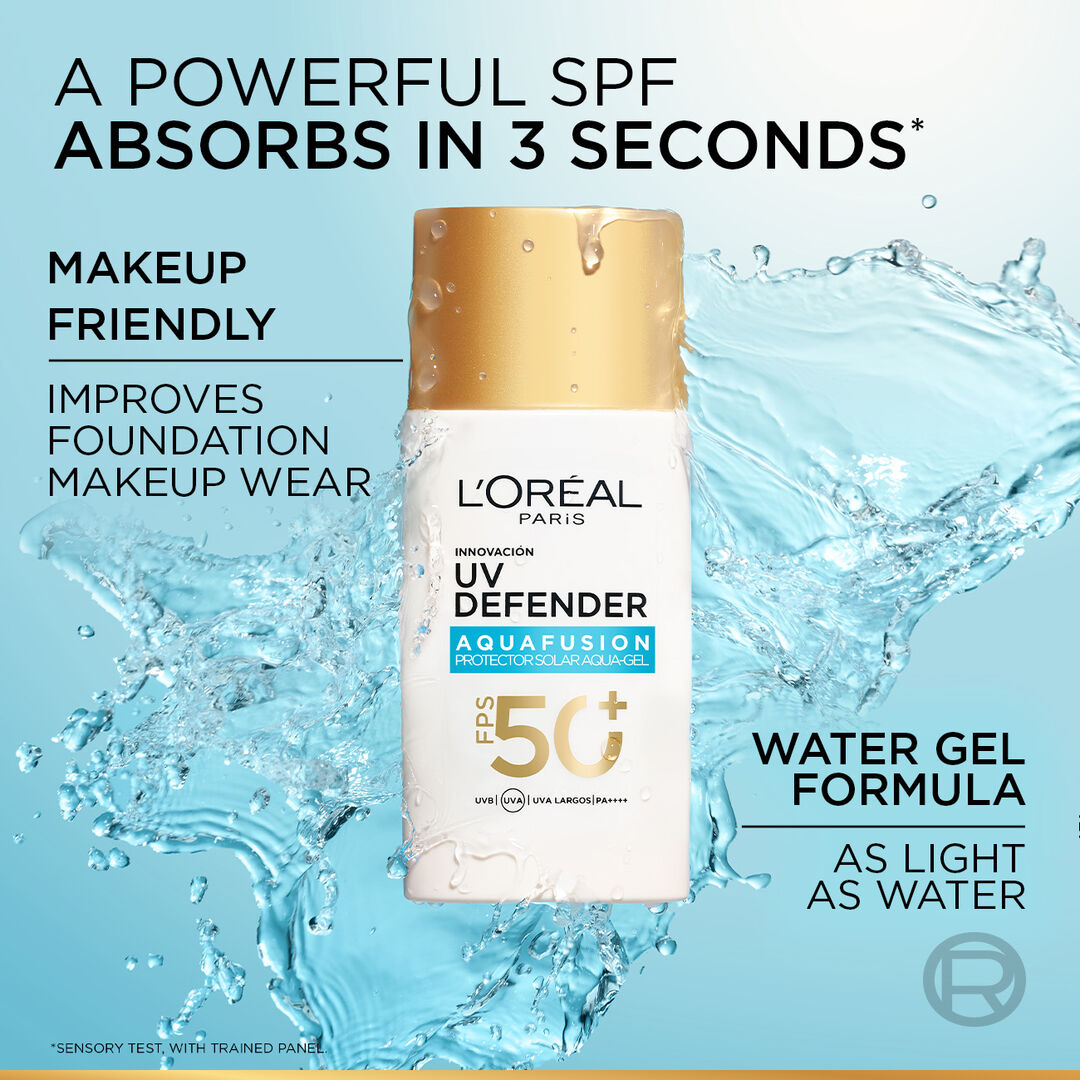 L'Oreal UV Defender AquaFusion sunscreen bottle with water droplets on a blue background